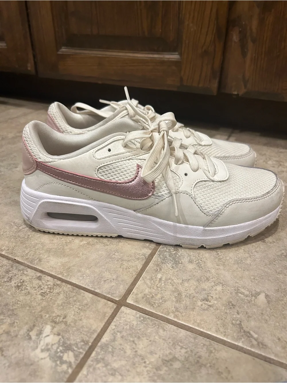 Nike Women's Cream Athletic Sneakers with Pink Swoosh